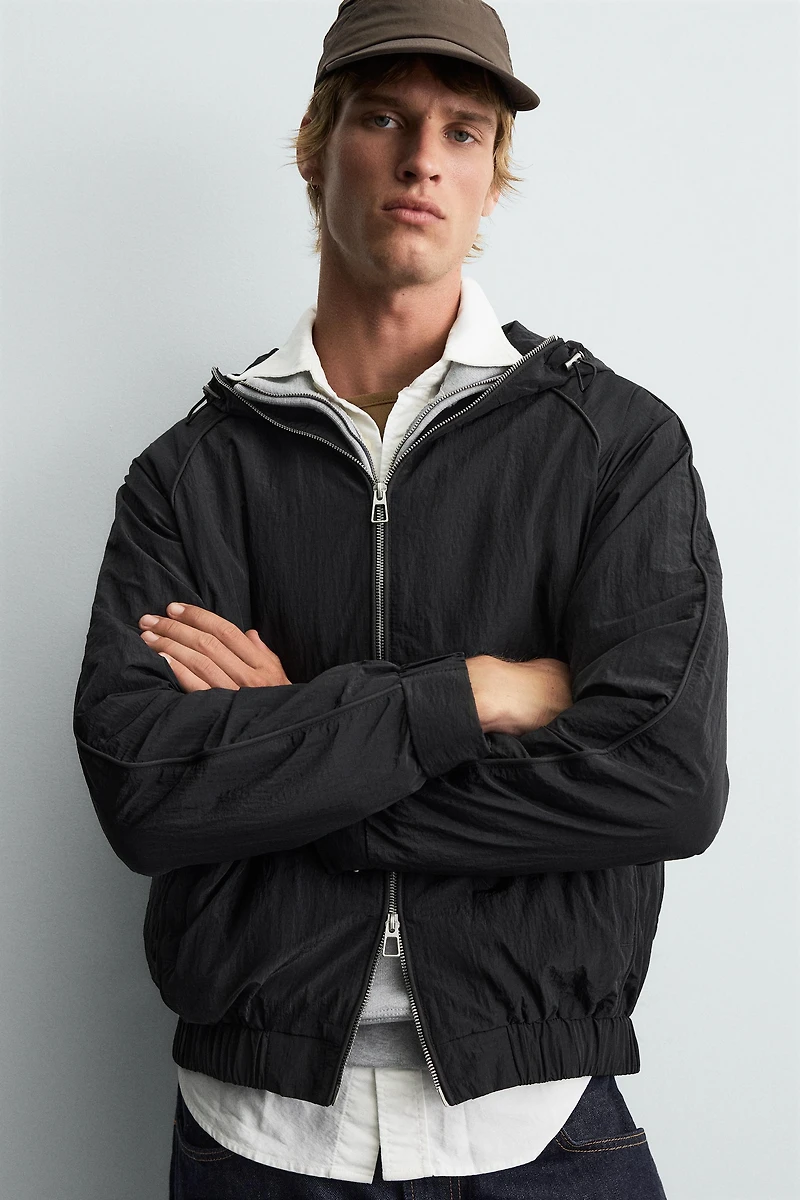 WATER REPELLENT LIGHTWEIGHT TECHNICAL JACKET