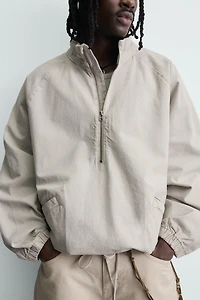 ZIPPERED POUCH POCKET SWEATSHIRT