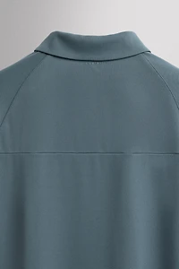 TECHNICAL PIQUÉ TRAINING POLO