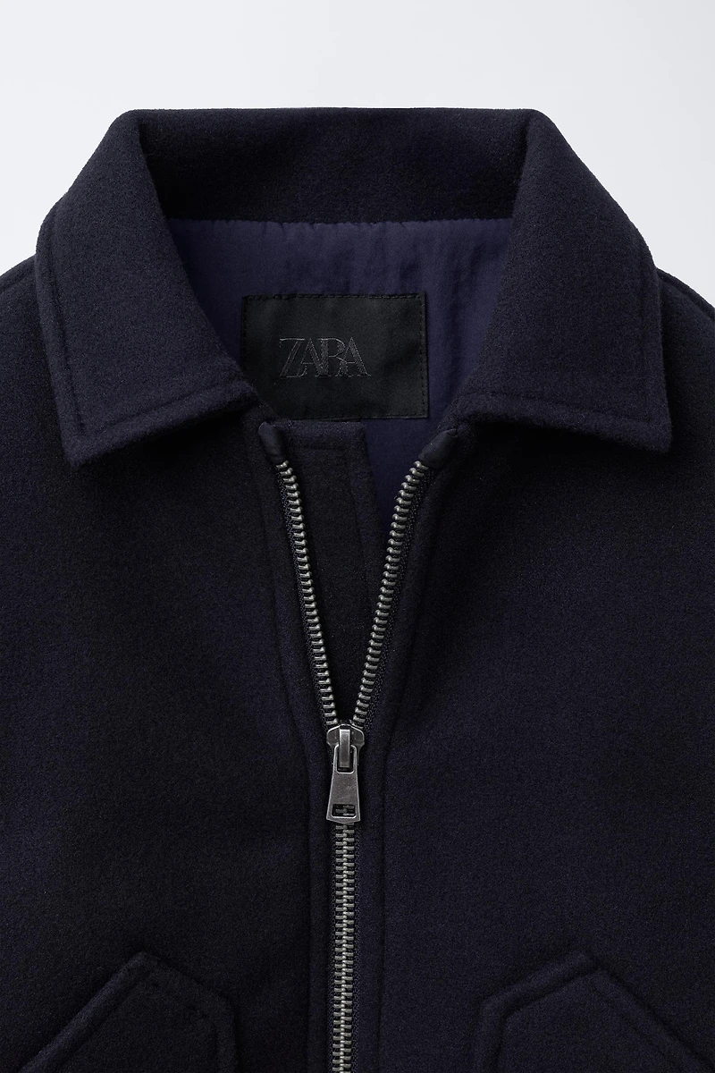 VESTE EN LAINE À POCHES