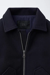 VESTE EN LAINE À POCHES