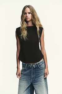 CREPE PEPLUM SHOULDER PAD TOP