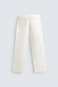 RELAXED FIT PLEATED PANTS