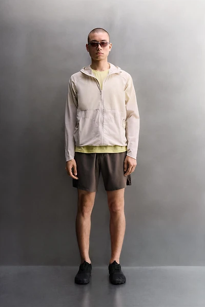 TECHNICAL WINDBREAKER JACKET