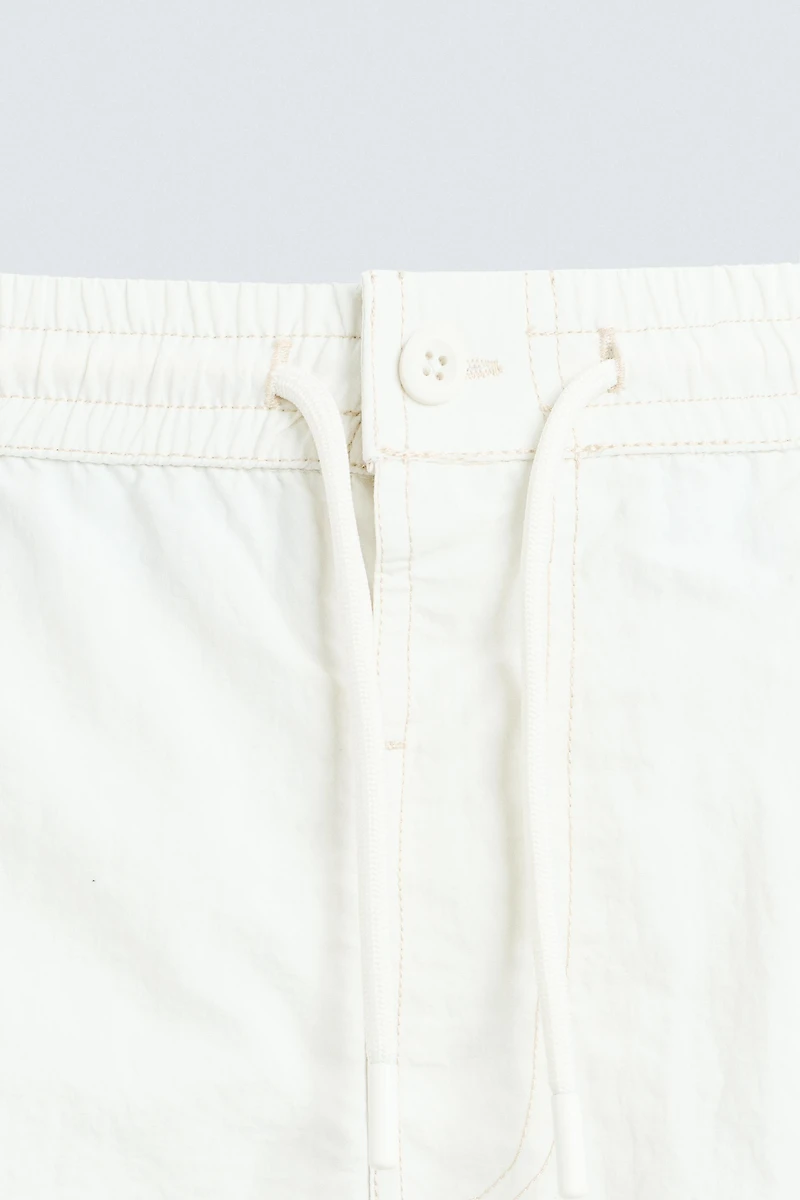 CONTRAST MID-LENGTH SWIMSUIT
