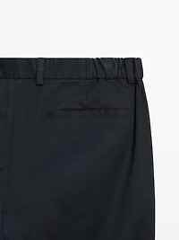 Slim fit trousers with elastic side detail