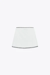 JUPE EN MAILLE BRODERIES CONTRASTE