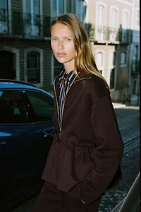 CONTRASTING PEPLUM BOMBER JACKET