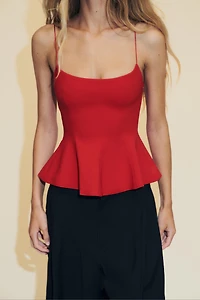 STRETCH PEPLUM TOP