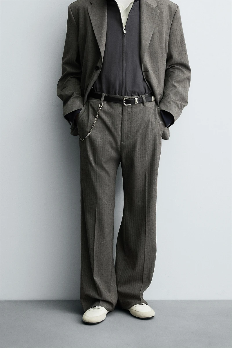 HERRINGBONE SUIT FLARE FIT PANTS