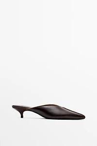 Heeled mule shoe