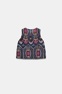 TOP À BRODERIES PERFORÉES