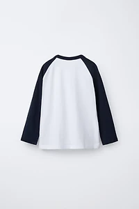T-SHIRT MANCHES RAGLAN INSCRIPTION BRODÉE