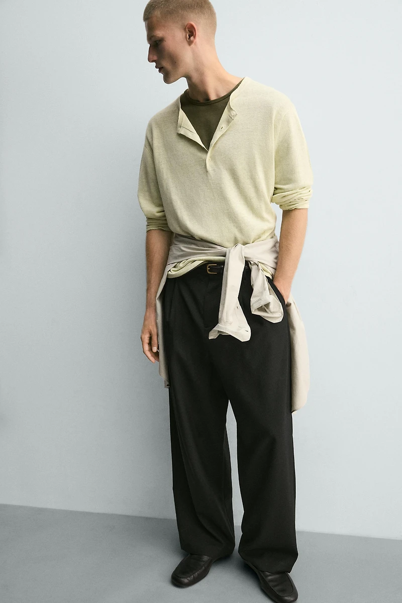 PANTALON RELAXED FIT À PLIS