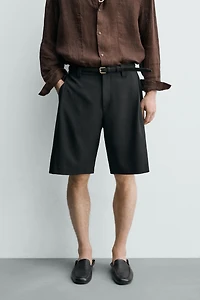 RELAXED FIT SIDE PLEAT SHORTS