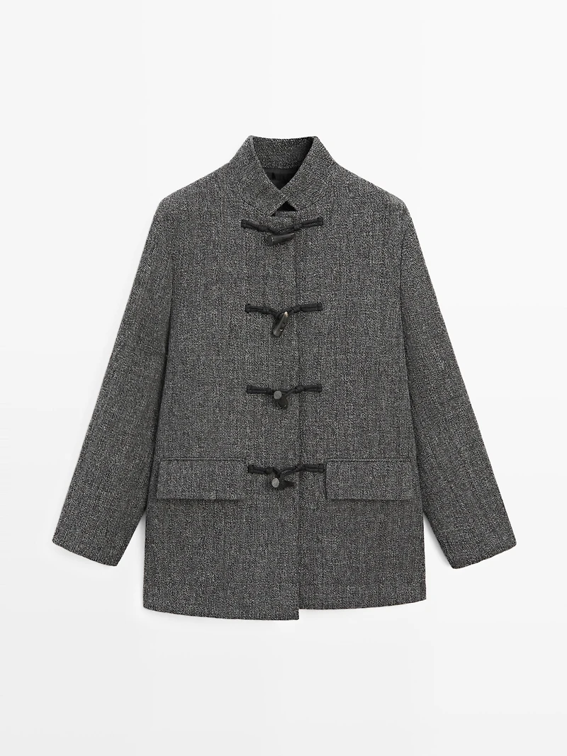 Mid-length coat with horn toggle