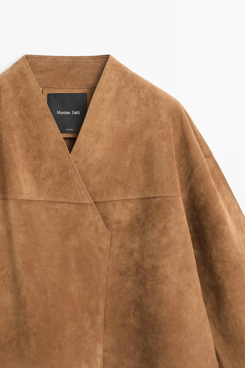 Veste courte croisée en cuir effet daim