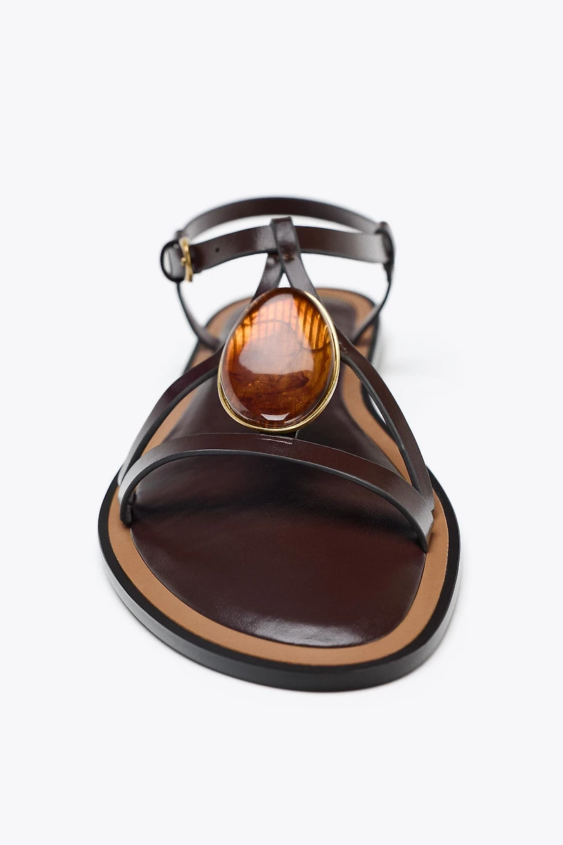 SANDALS WITH METALLIC APPLIQUÉ