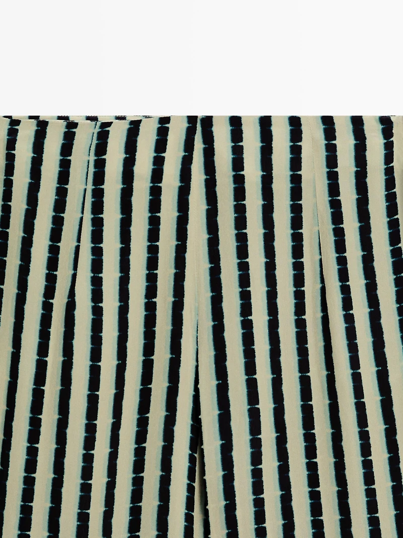 Striped flare fit trousers