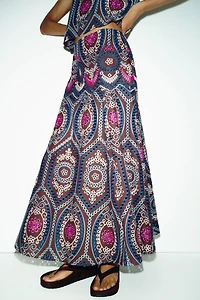 EMBROIDERED EYELET MIDI SKIRT