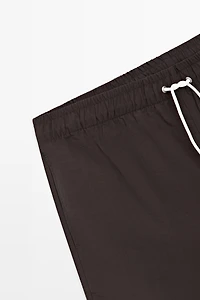 Solid Swim Trunks