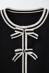 GILET EN MAILLE À NŒUDS