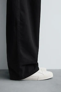 SNEAKERS WITH HEEL DETAIL