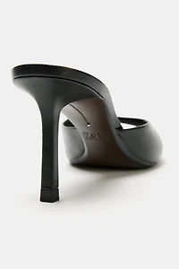MULES À TALONS EN CUIR