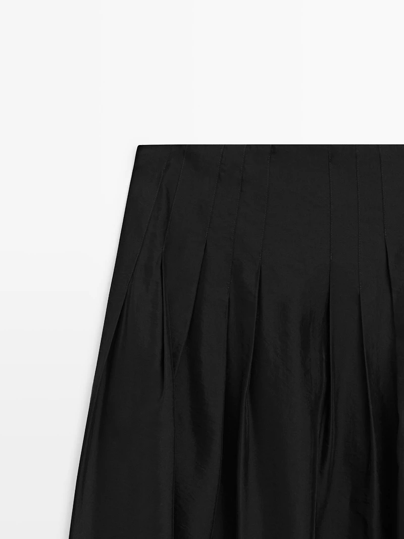 Flowing midi skirt with pintucks