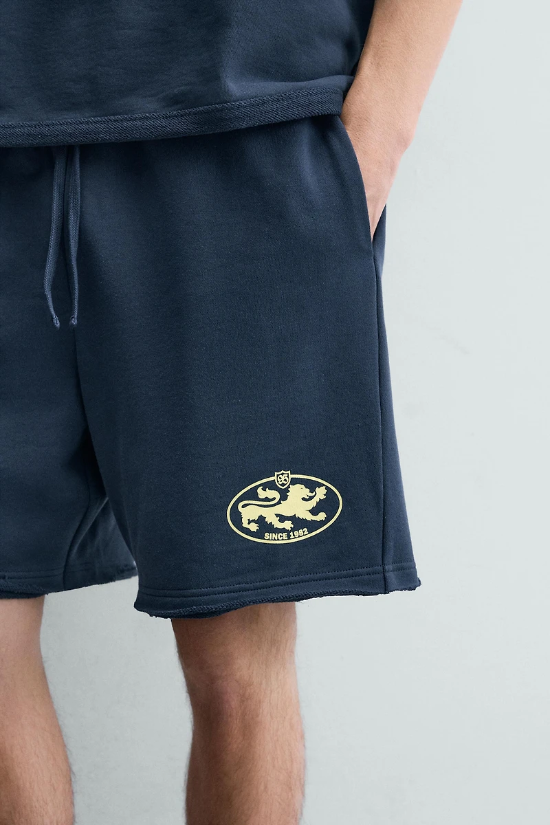 BERMUDA DE JOGGING À MOTIFS GRAPHIQUES