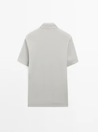 Textured short sleeve polo shirt