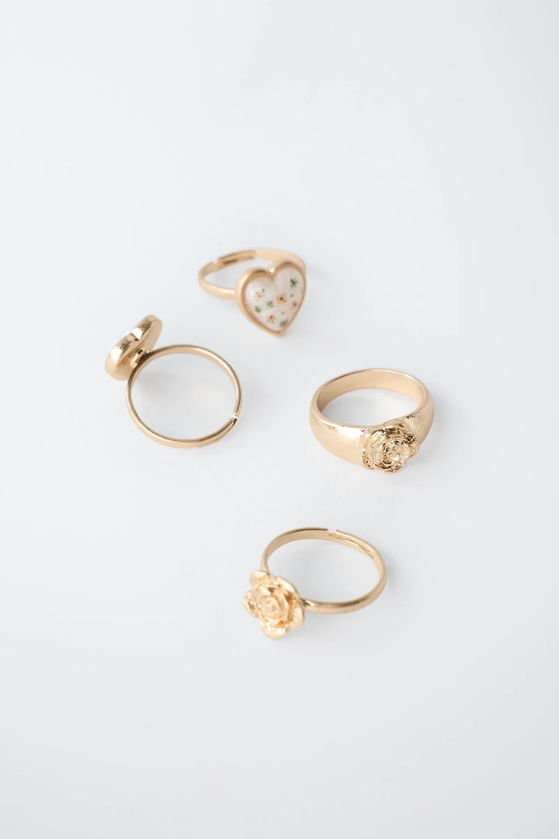 FOUR-PACK OF FLOWER AND HEART RINGS