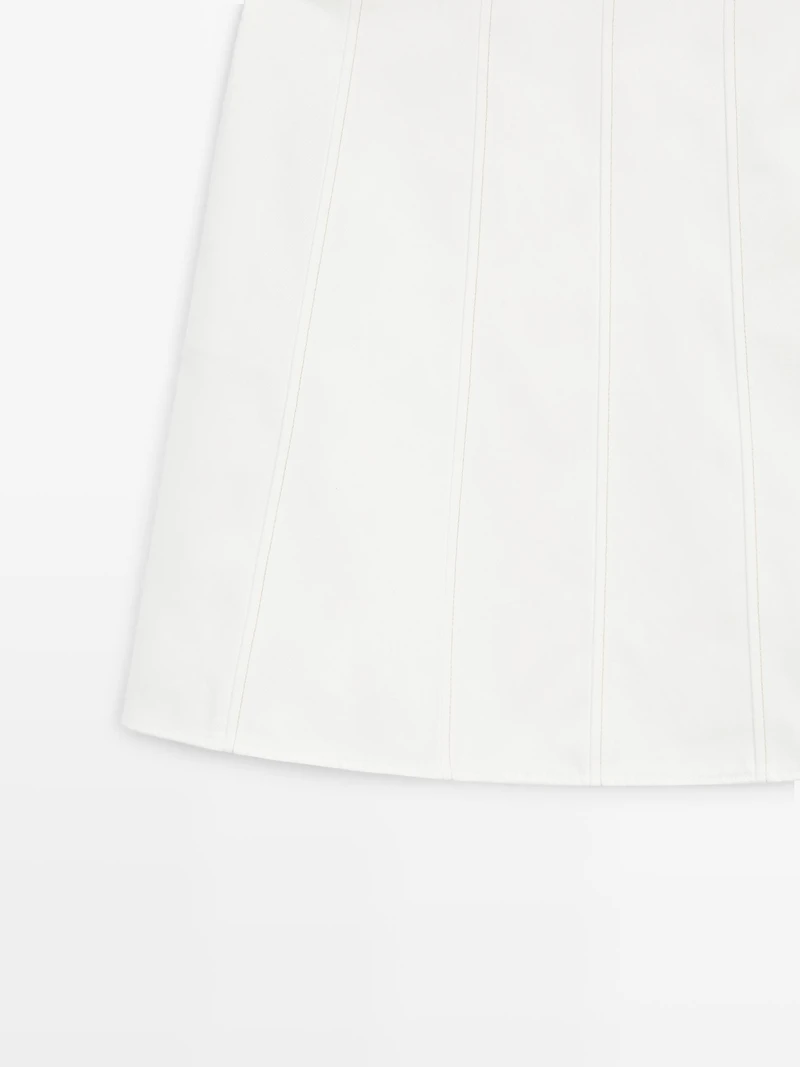 Short denim skirt with seam details