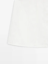 Short denim skirt with seam details