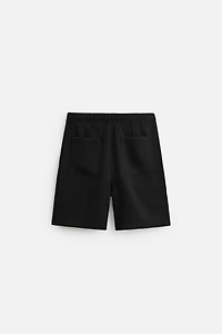 PLEATED FLOWY SHORTS