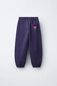 PANTALON DE JOGGING EN MOLLETON AVEC INSCRIPTION BRODÉE