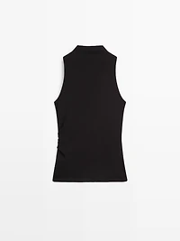 Funnel neck top with brooch detail