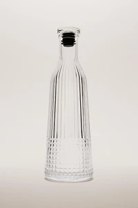 RAISED DESIGN GLASS BOTTLE