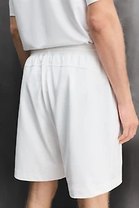 SHORT DE TRAINING EN MÉLANGE COTON 9"