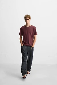 BASIC T-SHIRT WITH IRREGULAR HEM