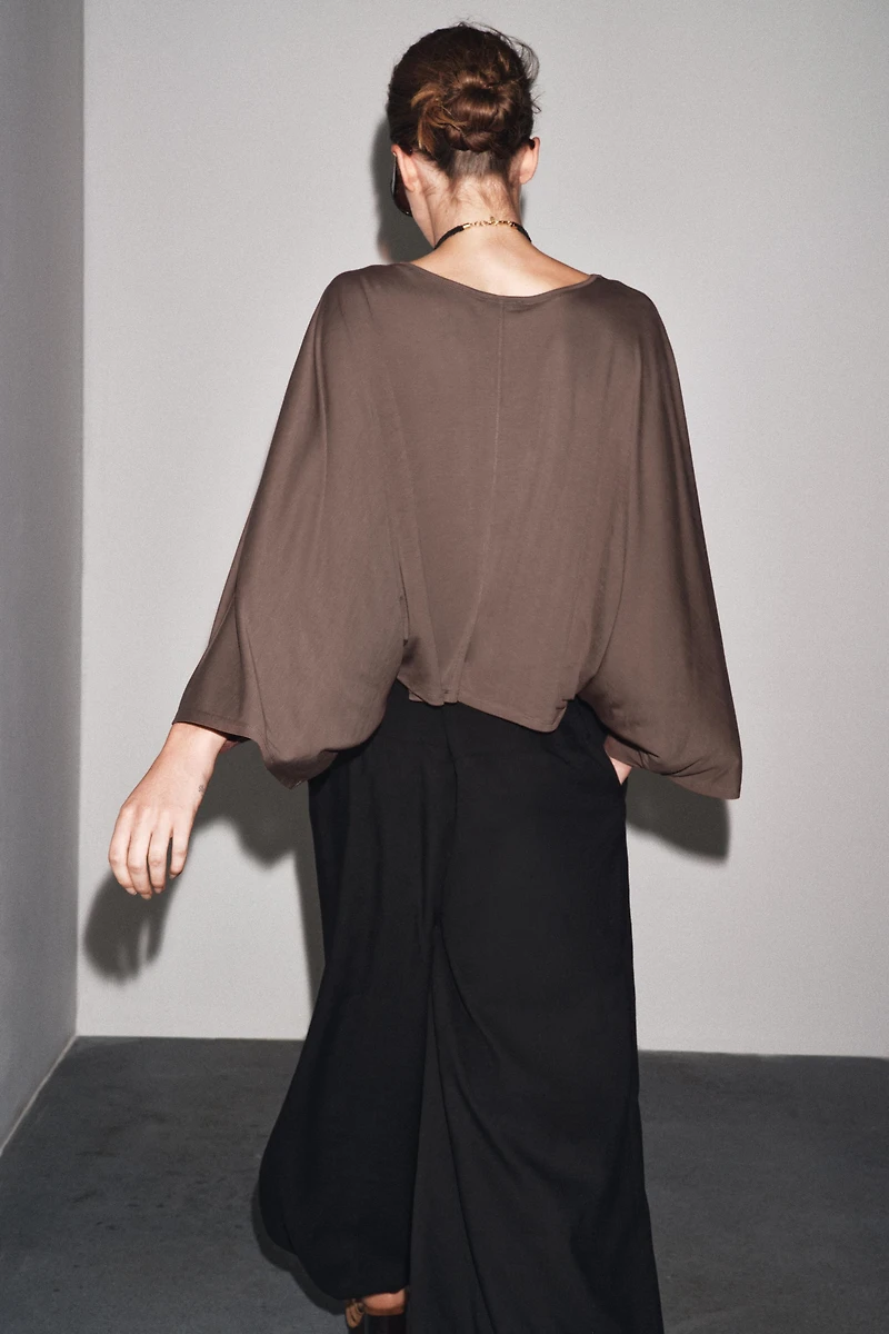 ASYMMETRIC FLOWY CAPE