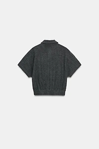 VESTE SOUPLE À MANCHES COURTES