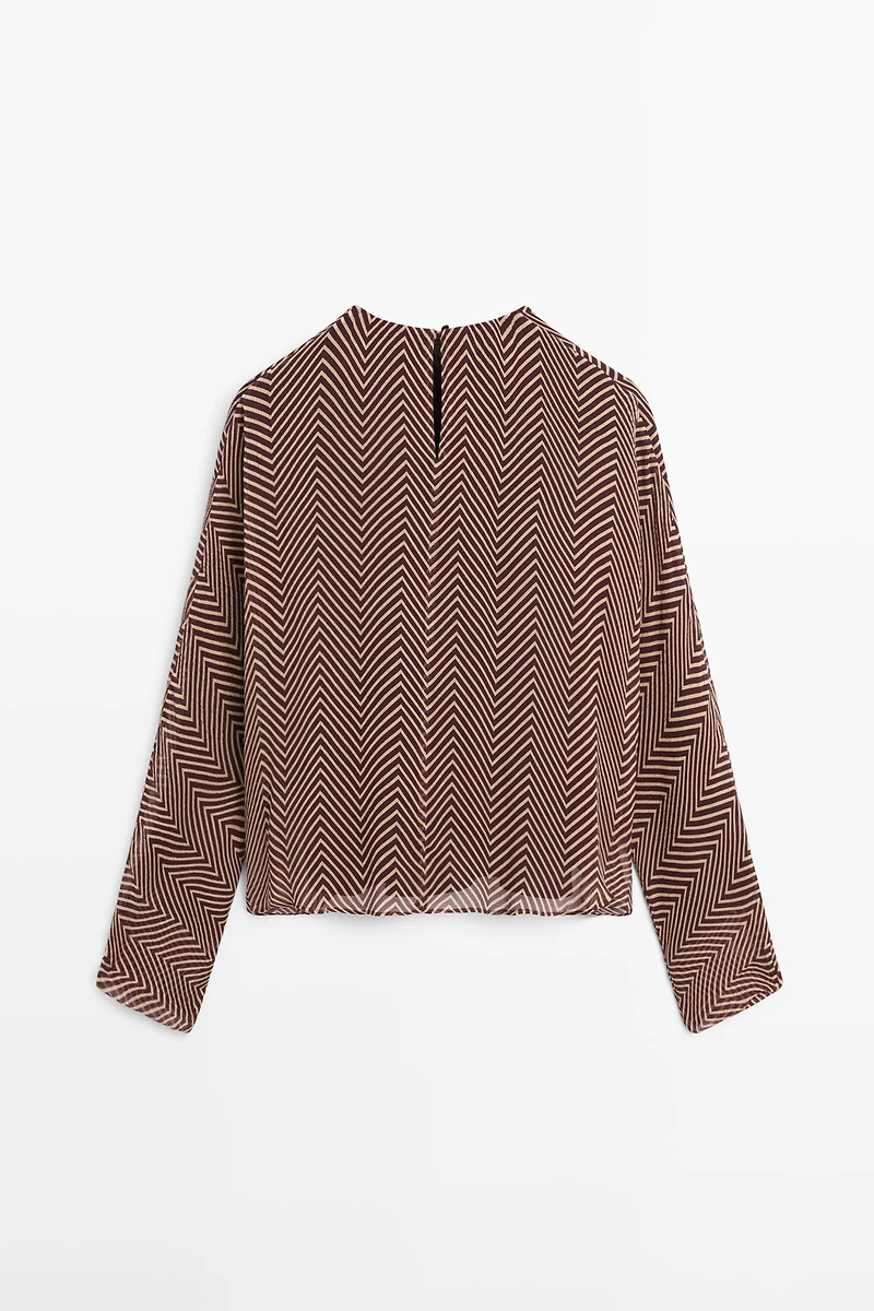 Flowing geometric print blouse