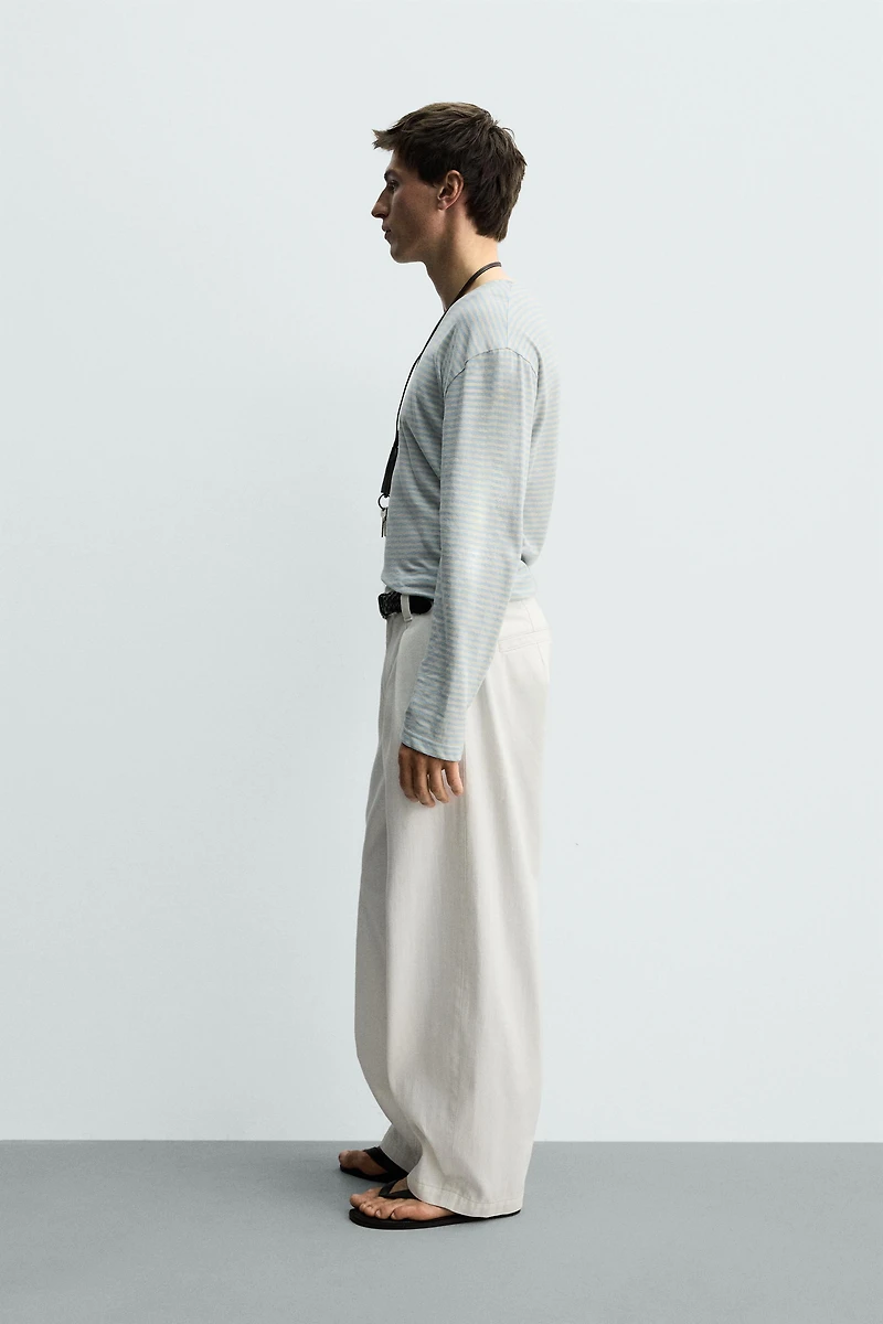 PLEATED BARREL FIT DENIM CHINO PANTS