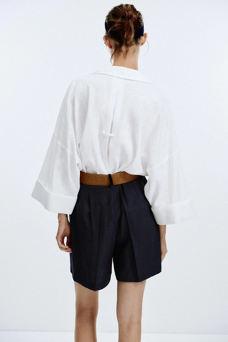 PLEATED BELT SHORTS