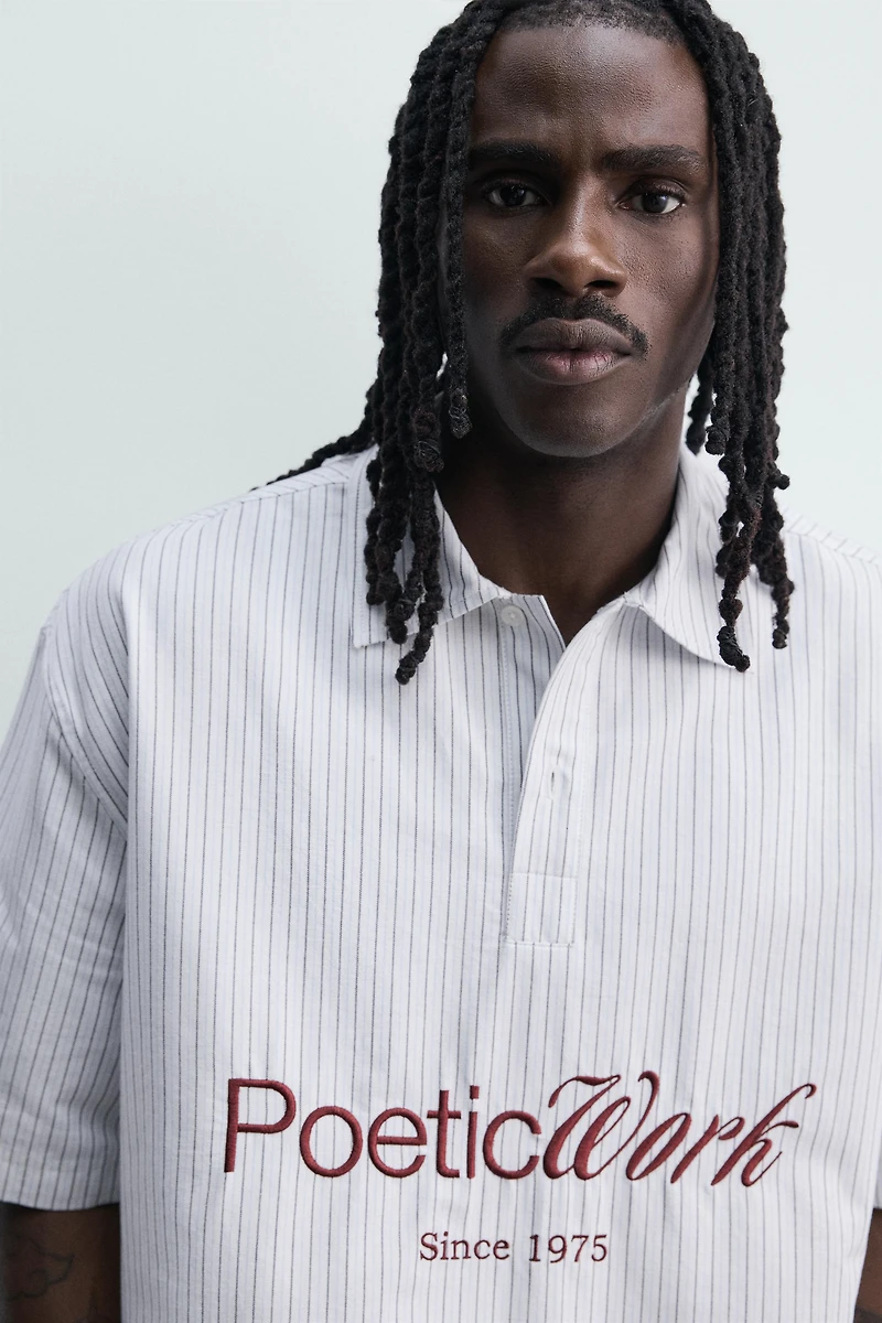 PRINTED TEXT BOXY FIT POLO SHIRT