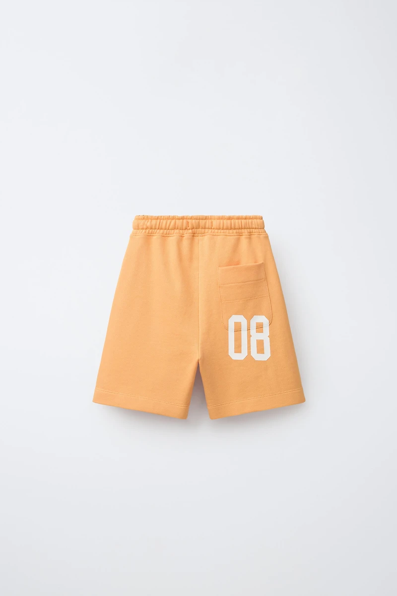 NUMBER PRINT JOGGING SHORTS