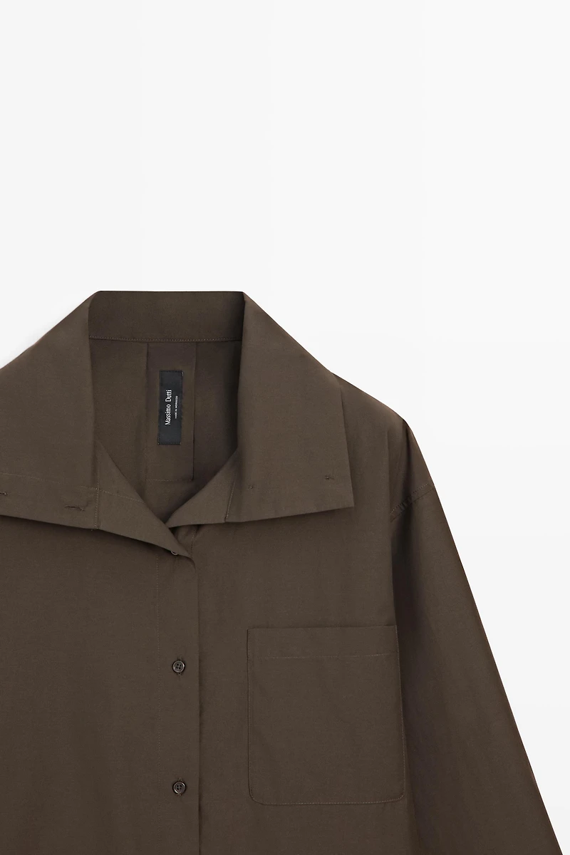 High collar overshirt with buckle detail