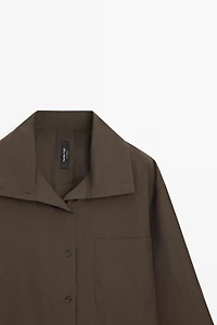 High collar overshirt with buckle detail