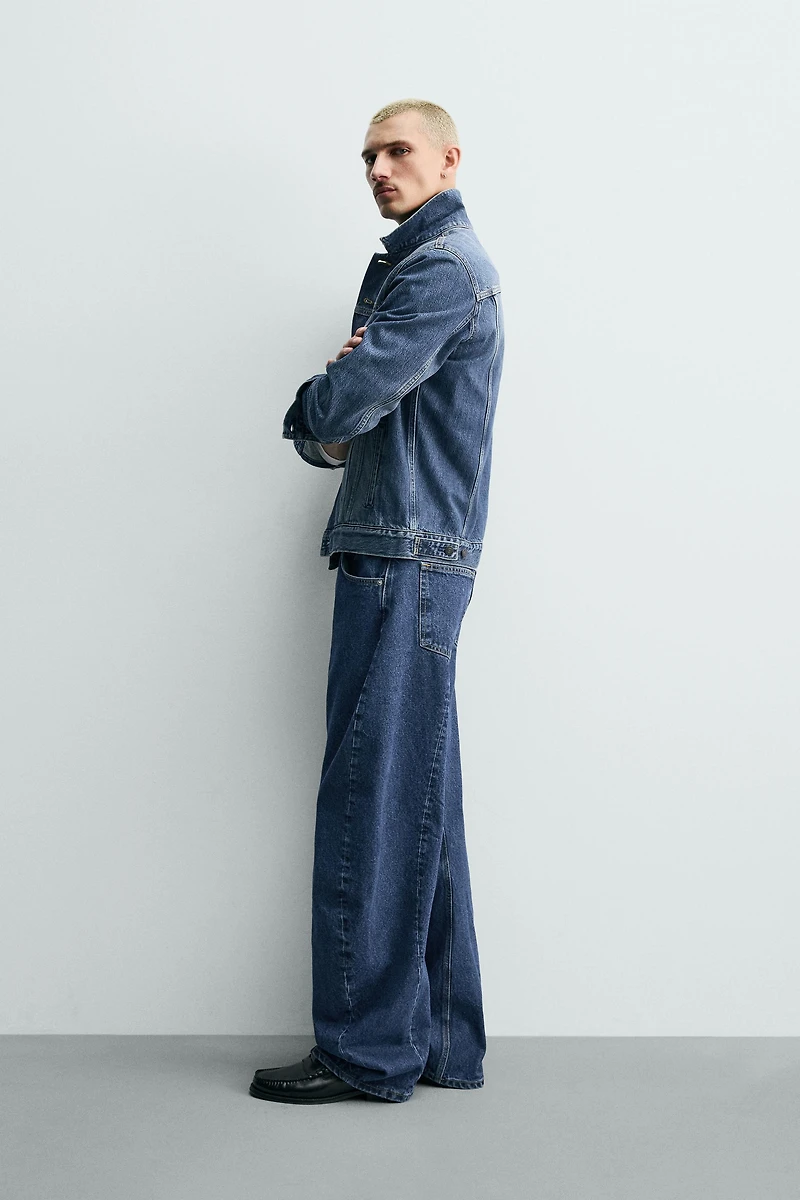 BARREL FIT JEANS WITH TWISTED SEAM